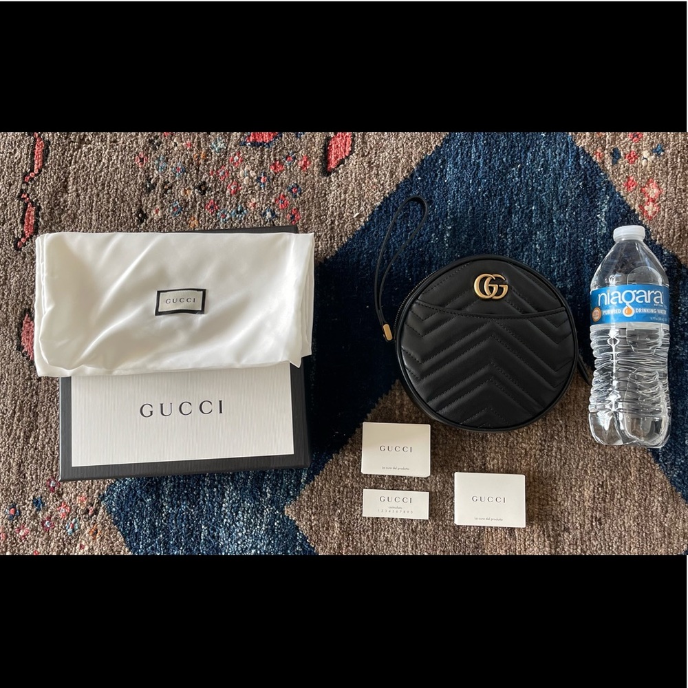 Gucci mini circle leather purse. Perfect for a night out.